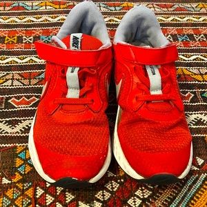 Size 1 Red Nike Revolutions